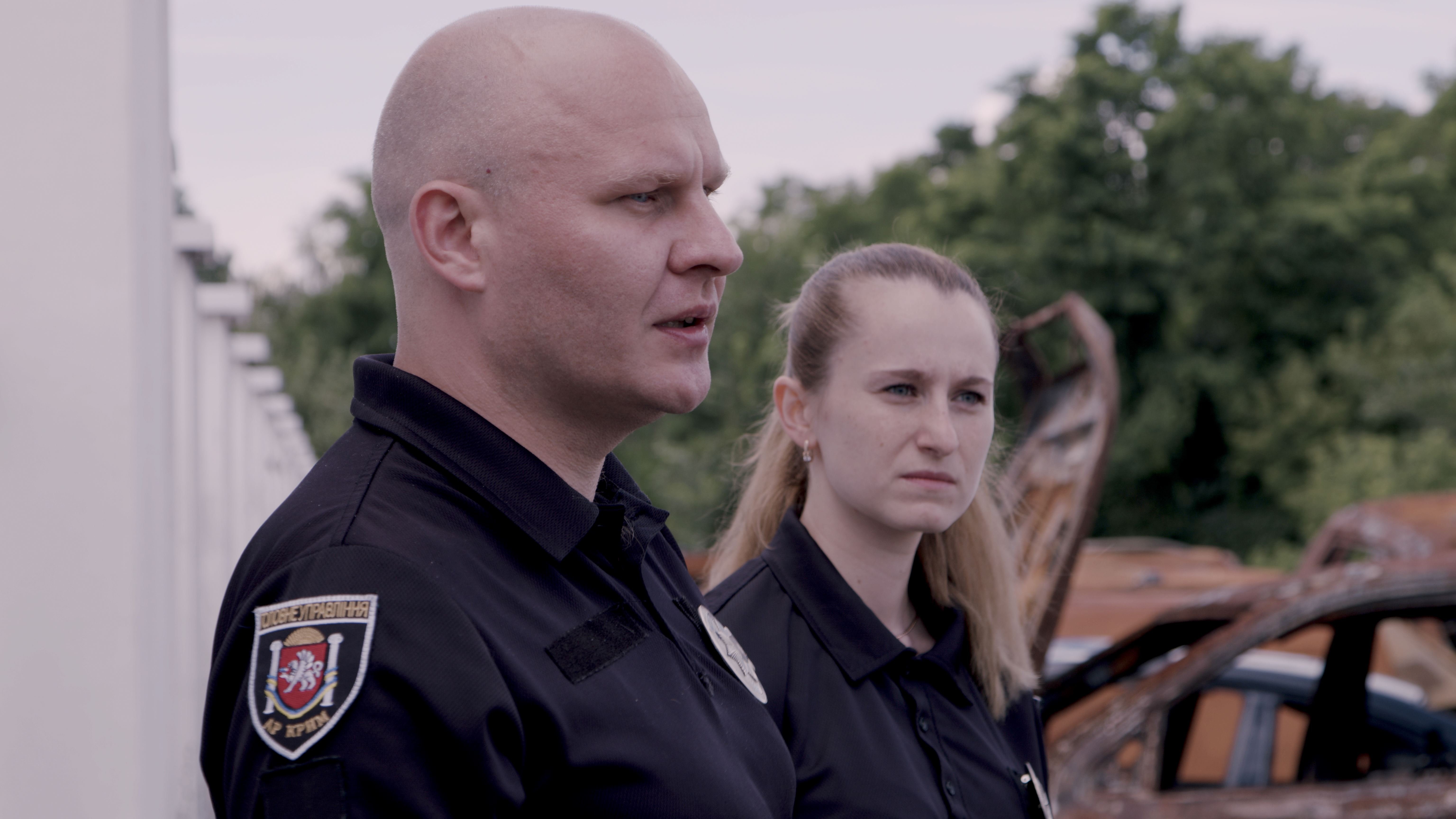 Alina Mashkina and Andrii Vyshniak, investigators of the National Police in Crimea and Sevastopol, who investigated the killings on the Zhytomyr highway. Photo: DENOTAT documentary group, Roman Synchuk