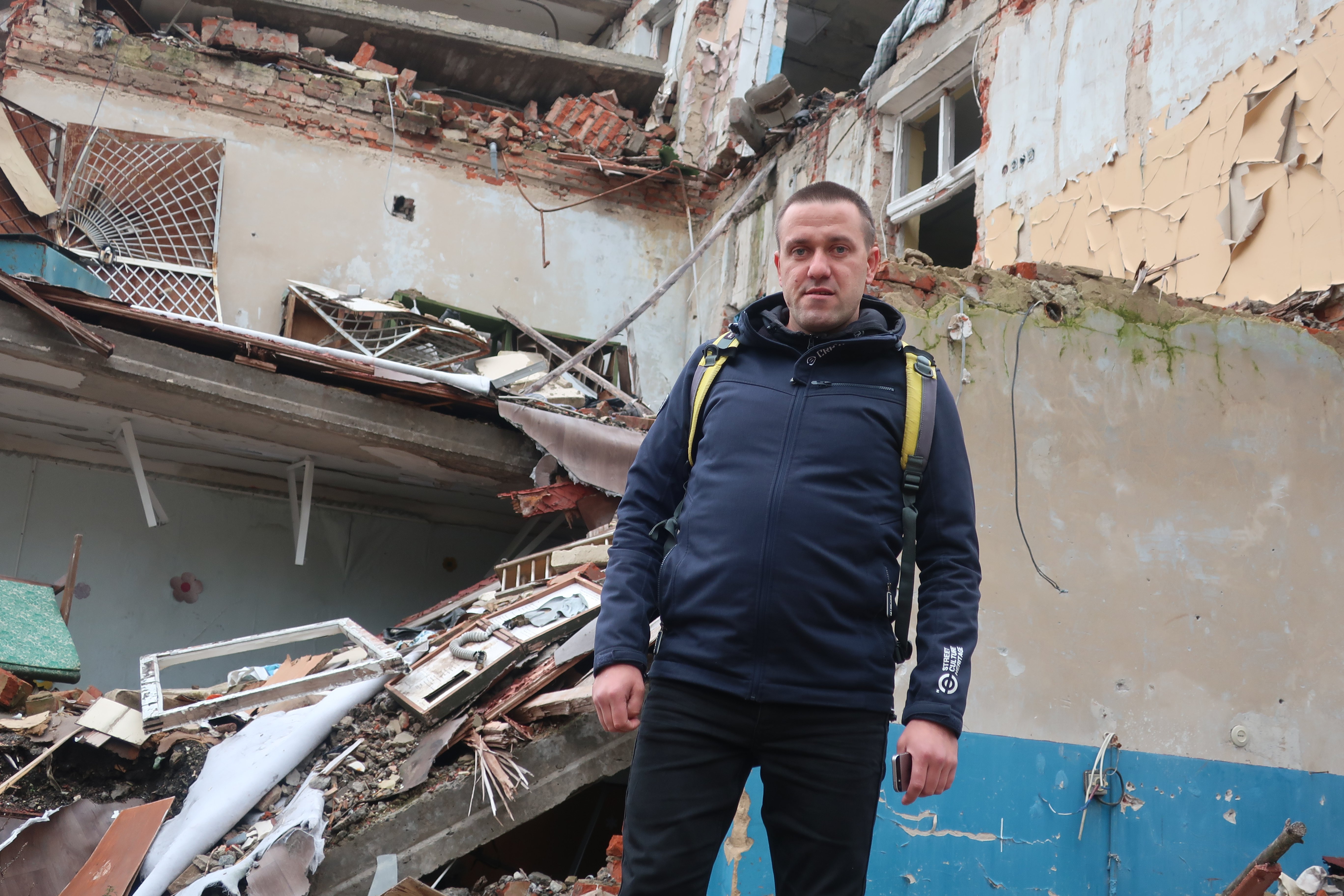 Mykola Topol on the ruins of school No. 18