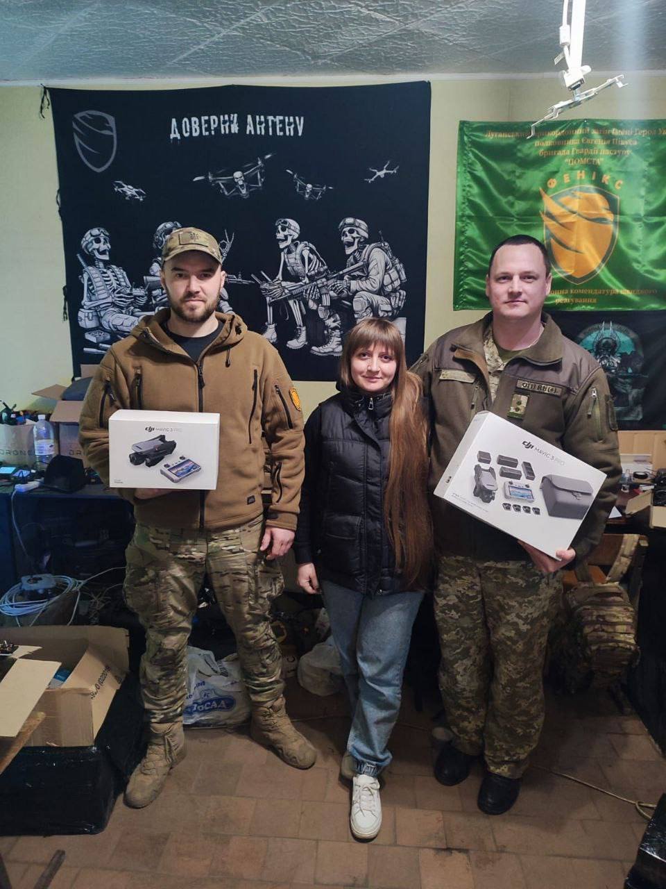 Svitlana Trubachova with her husband's comrades-in-arms whom she brought the drones to. Photo from the personal archive