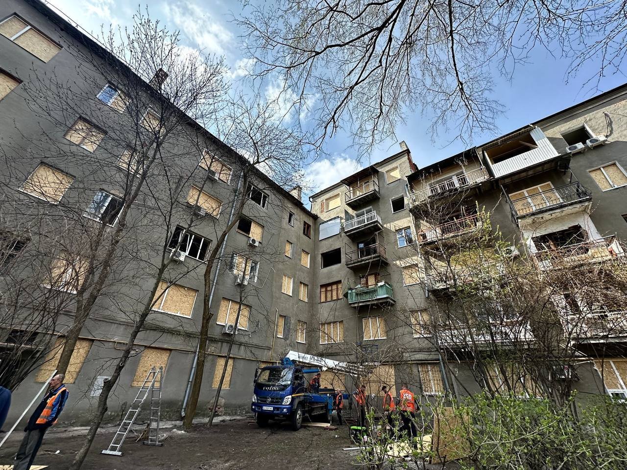 A house with boarded-up windows after shelling in Kharkiv. Photo: Kharkiv City Council