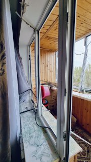 A wrecked balcony full of shattered glass in the apartment of Serhiy Demidovets. Photo provided by the owner of the apartment